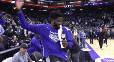 Basketball Player In Kings Shirt Holding Microphone GIF