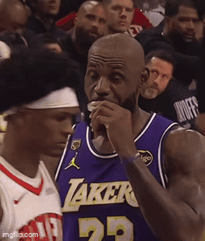 Basketball Player In Lakers Jersey Eating GIF