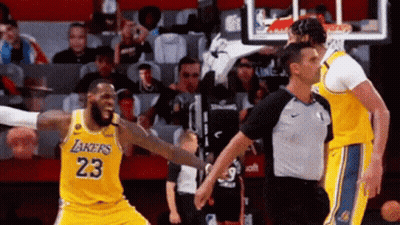 Basketball Player In Lakers Jersey Talking To Referee GIF