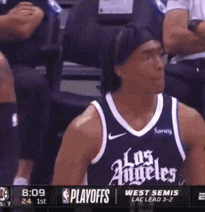 Basketball Player In Los Angeles Jersey Sitting In Stands GIF