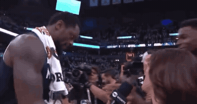 Basketball Player In Minnesota Jersey Shaking Hands GIF