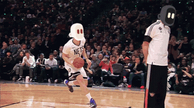 Basketball Player In Nets Jersey Dribbling GIF