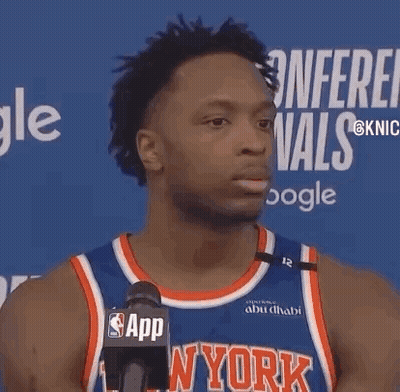 Basketball Player In New York Jersey Talking Into Microphone GIF