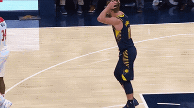 Basketball Player In Number 10 Jersey Dribbling GIF