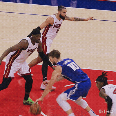 Basketball Player In Number 10 Jersey Dribbling GIF