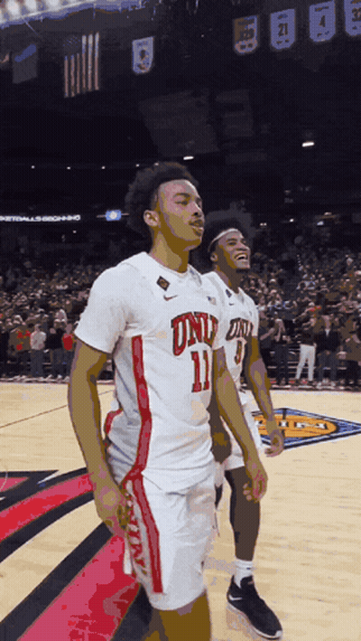 Basketball Player In Number 11 Jersey Standing On Court GIF
