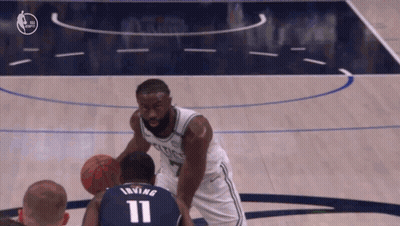 Basketball Player In Number 20 Jersey Laying On Floor GIF