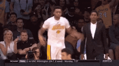 Basketball Player In Number 24 Jersey Dancing In Front Of Crowd GIF