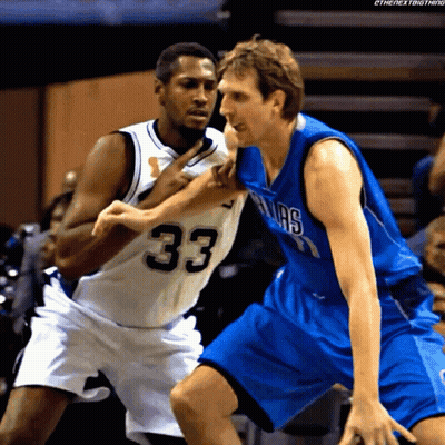 Basketball Player In Number 33 Jersey Blocking Another Player GIF