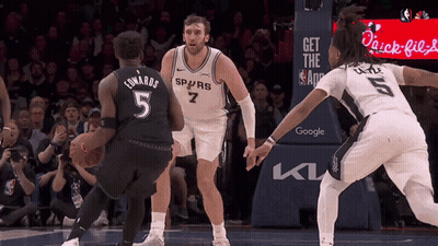 Basketball Player In Number 5 Jersey Dribbling GIF