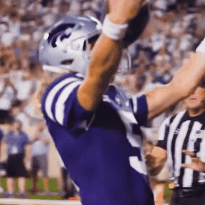 Basketball Player In Number 5 Jersey In Front Of Muscle Milk Sign GIF