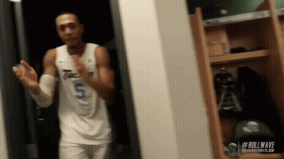 Basketball Player In Number 5 Jersey In Locker Room GIF