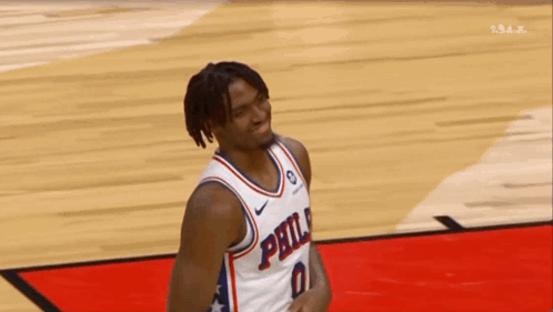 Basketball Player In Philadelphia Jersey Holding Ball GIF