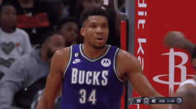 Basketball Player In Purple Bucks Jersey GIF