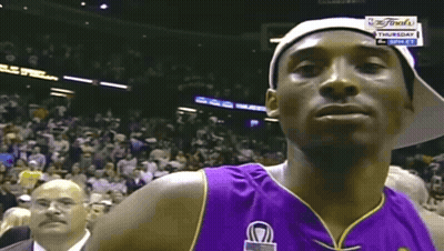 Basketball Player In Purple Jersey And White Hat GIF