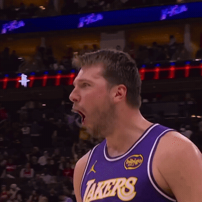 Basketball Player in Purple Lakers Jersey Mouth Open