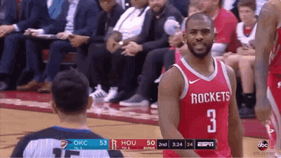 Basketball Player In Red Jersey Number 3 Facing Referee GIF