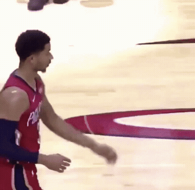 Basketball Player In Red Jersey Walking On Court GIF