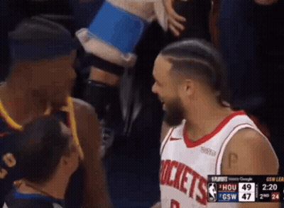 Basketball Player in Rockets Jersey Talking