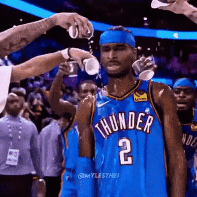 Basketball Player in Thunder Jersey Being Poured With Water