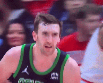 Basketball Player In Vista Paint Jersey Looking At Camera GIF