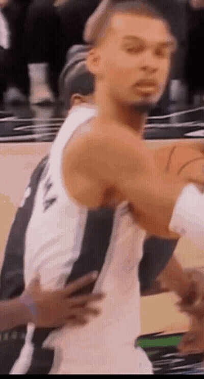 Basketball Player In White Tank Top Holding Basketball GIF