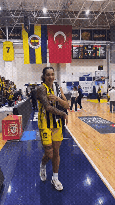 Basketball Player In Yellow And Black Jersey Number 7 GIF
