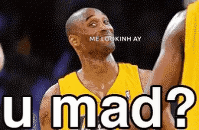 Basketball Player in Yellow Jersey Asking Question