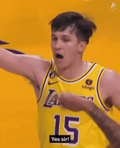 Basketball Player In Yellow Jersey Fist Bump GIF