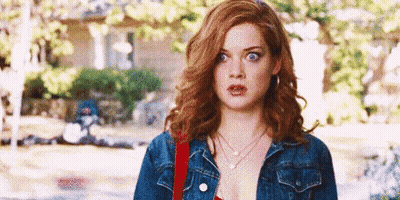 Basketball Player In Yellow Jersey Looking At Camera GIF