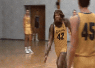 Basketball Player In Yellow Jersey Number 42 GIF