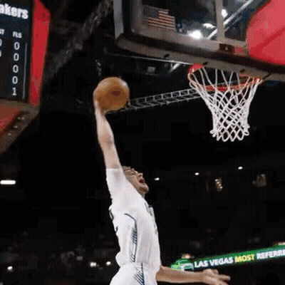Basketball Player In Yellow Jersey Standing Next To Player In White Jersey GIF