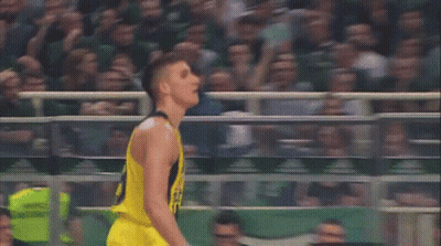 Basketball Player In Yellow Jersey With Crowd GIF