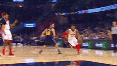 Basketball Player In Yellow Michigan Jersey GIF