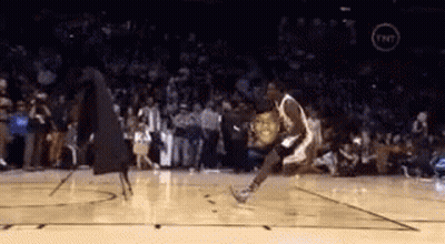 Basketball Player Jumping Dribbling