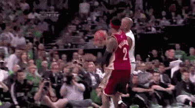 Basketball Player Jumping Over Another GIF