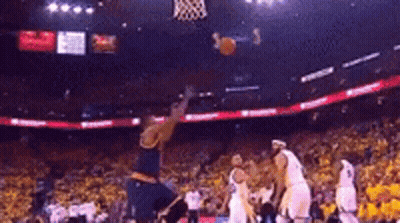 Basketball Player Jumping To Catch Ball GIF