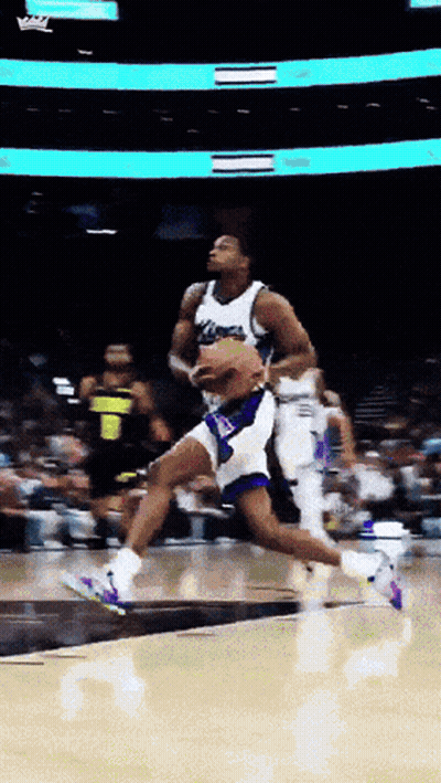 Basketball Player Jumping With Ball GIF