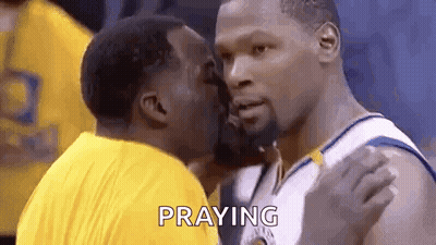 Basketball Player Kissing Another Player On Cheek GIF