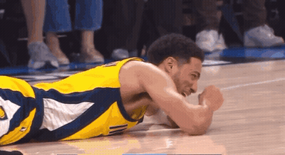 Basketball Player Lying On Floor GIF