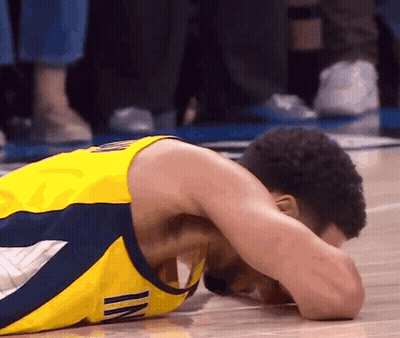 Basketball Player Lying On Floor GIF