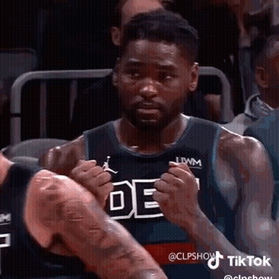 Basketball Player Making Funny Face In Stands GIF