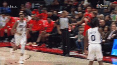 Basketball Player Number 0 Talking To Referee GIF