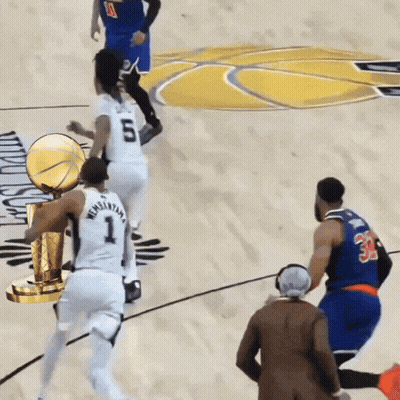Basketball Player Number 1 Holding Trophy GIF