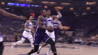 Basketball Player Number 10 Dribbling GIF