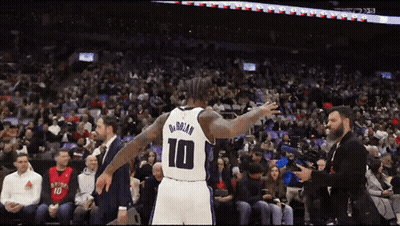 Basketball Player Number 10 In Front Of Crowd GIF
