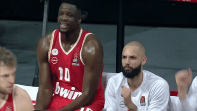 Basketball Player Number 10 Jersey Sitting On Bench GIF