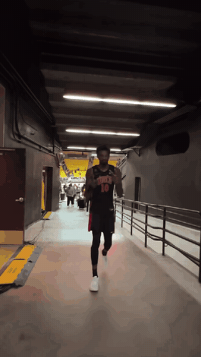 Basketball Player Number 10 Running Down Hallway GIF