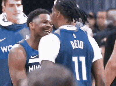 Basketball Player Number 11 Talking To Another Player GIF