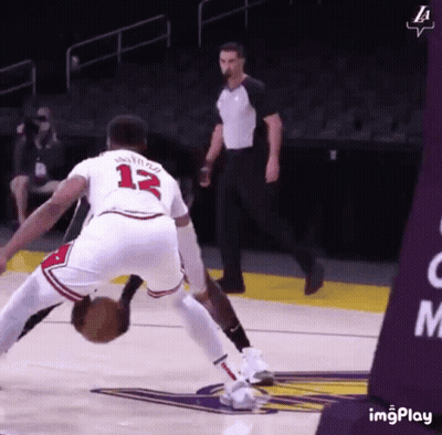 Basketball Player Number 13 Dribbling GIF
